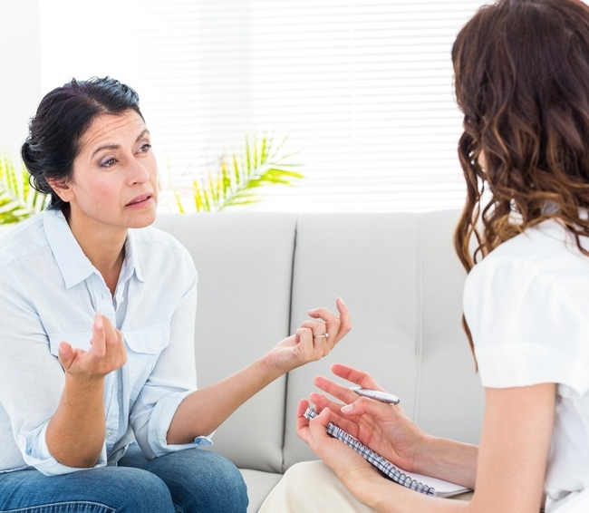 therapist talking with a client